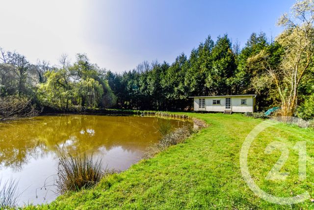 Afficher la photo en grand maison à vendre - 4 pièces - 88.37 m2 - RUILLE FROID FONDS - 53 - PAYS-DE-LOIRE - Century 21 Dréano Immobilier